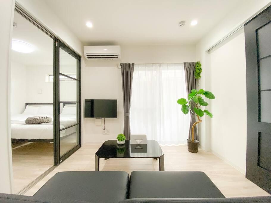 Residential Hotel Glitter Usjまで1駅5分 Ōsaka Zimmer foto