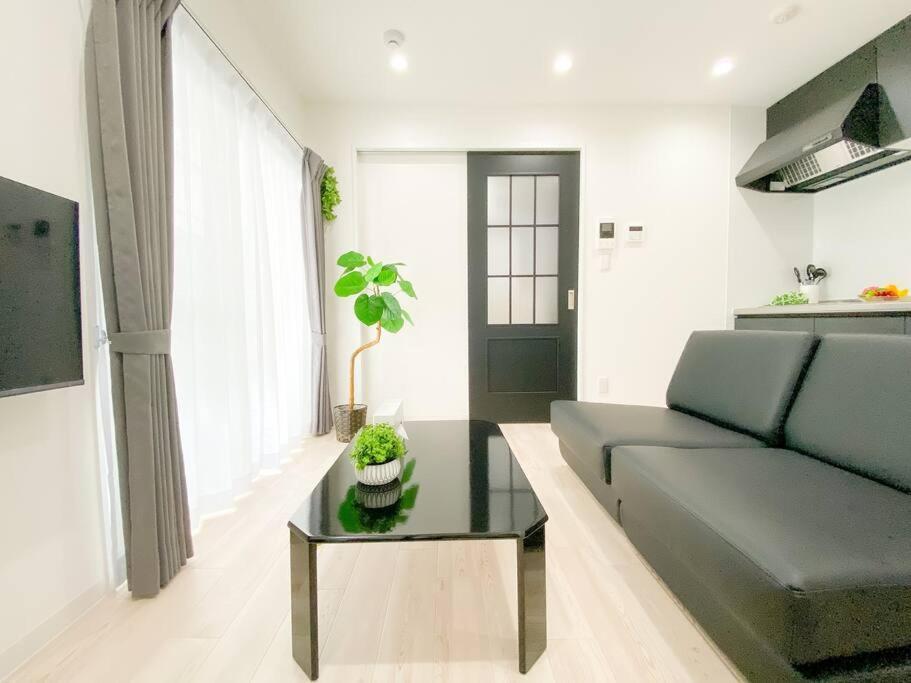 Residential Hotel Glitter Usjまで1駅5分 Ōsaka Zimmer foto