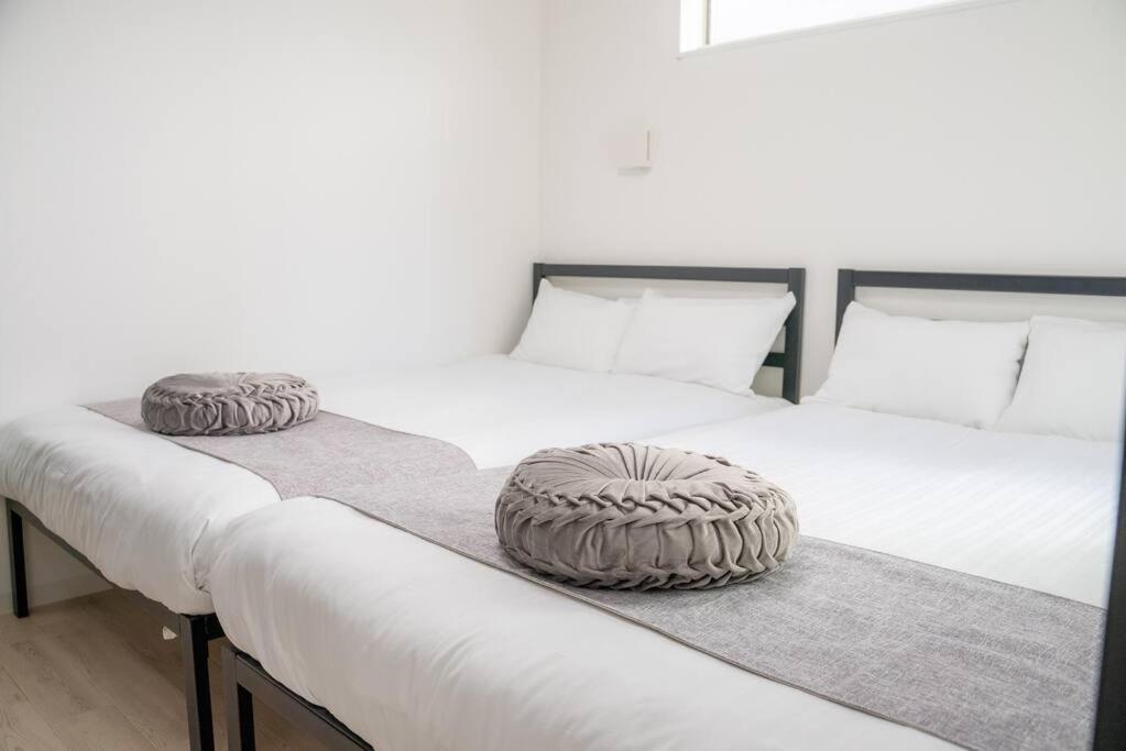 Residential Hotel Glitter Usjまで1駅5分 Ōsaka Zimmer foto