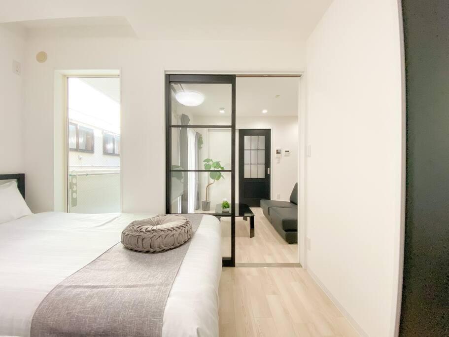 Residential Hotel Glitter Usjまで1駅5分 Ōsaka Zimmer foto