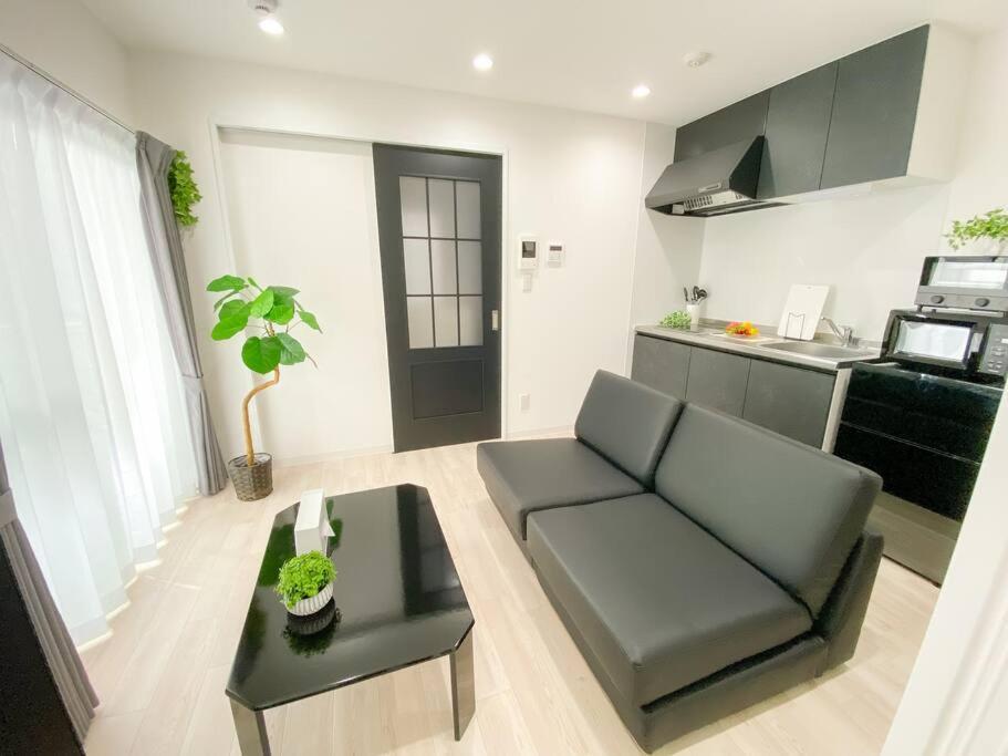 Residential Hotel Glitter Usjまで1駅5分 Ōsaka Zimmer foto