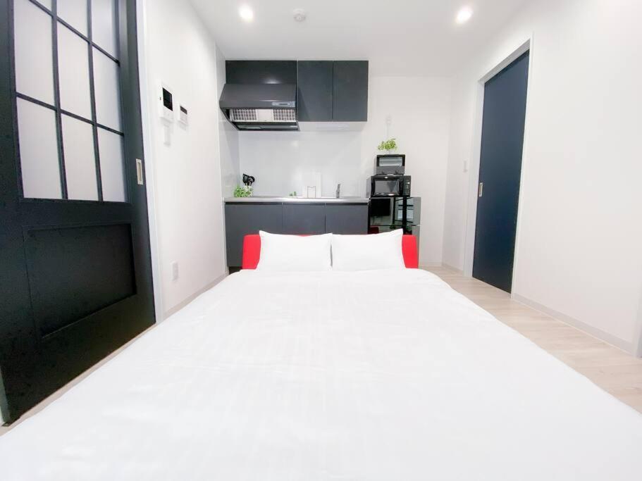 Residential Hotel Glitter Usjまで1駅5分 Ōsaka Zimmer foto