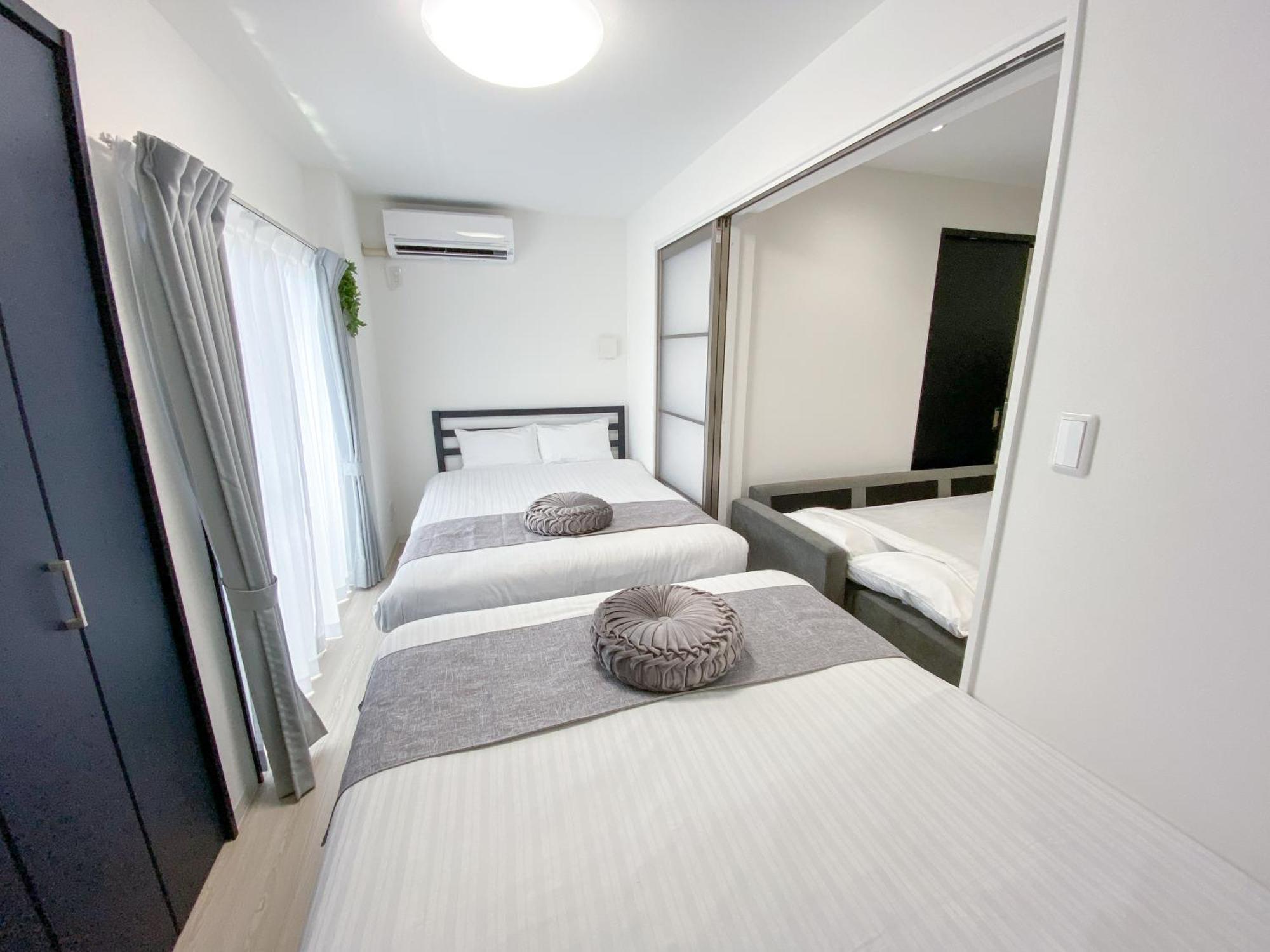 Residential Hotel Glitter Usjまで1駅5分 Ōsaka Zimmer foto