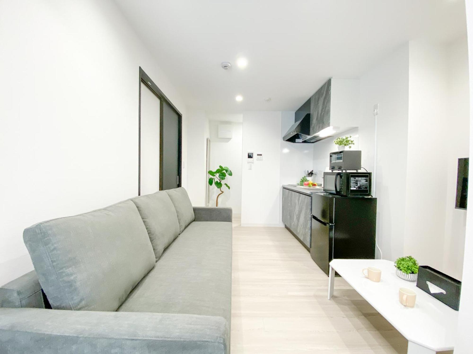 Residential Hotel Glitter Usjまで1駅5分 Ōsaka Zimmer foto