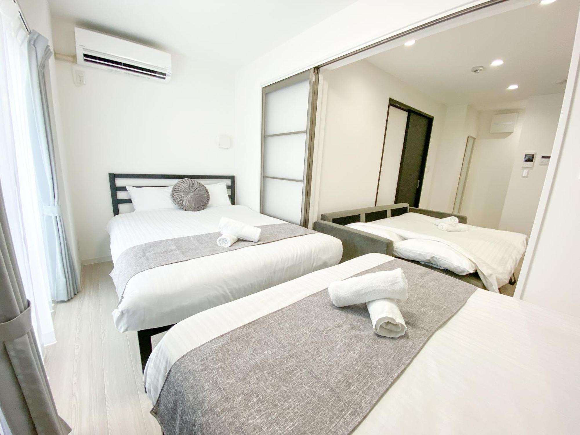 Residential Hotel Glitter Usjまで1駅5分 Ōsaka Zimmer foto